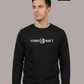 Mann in schwarzem Pullover mit weißem Aufdruck „STAND HAFT“ und Adler-Logo blickt seitlich vor grauem Hintergrund. AI-generated.